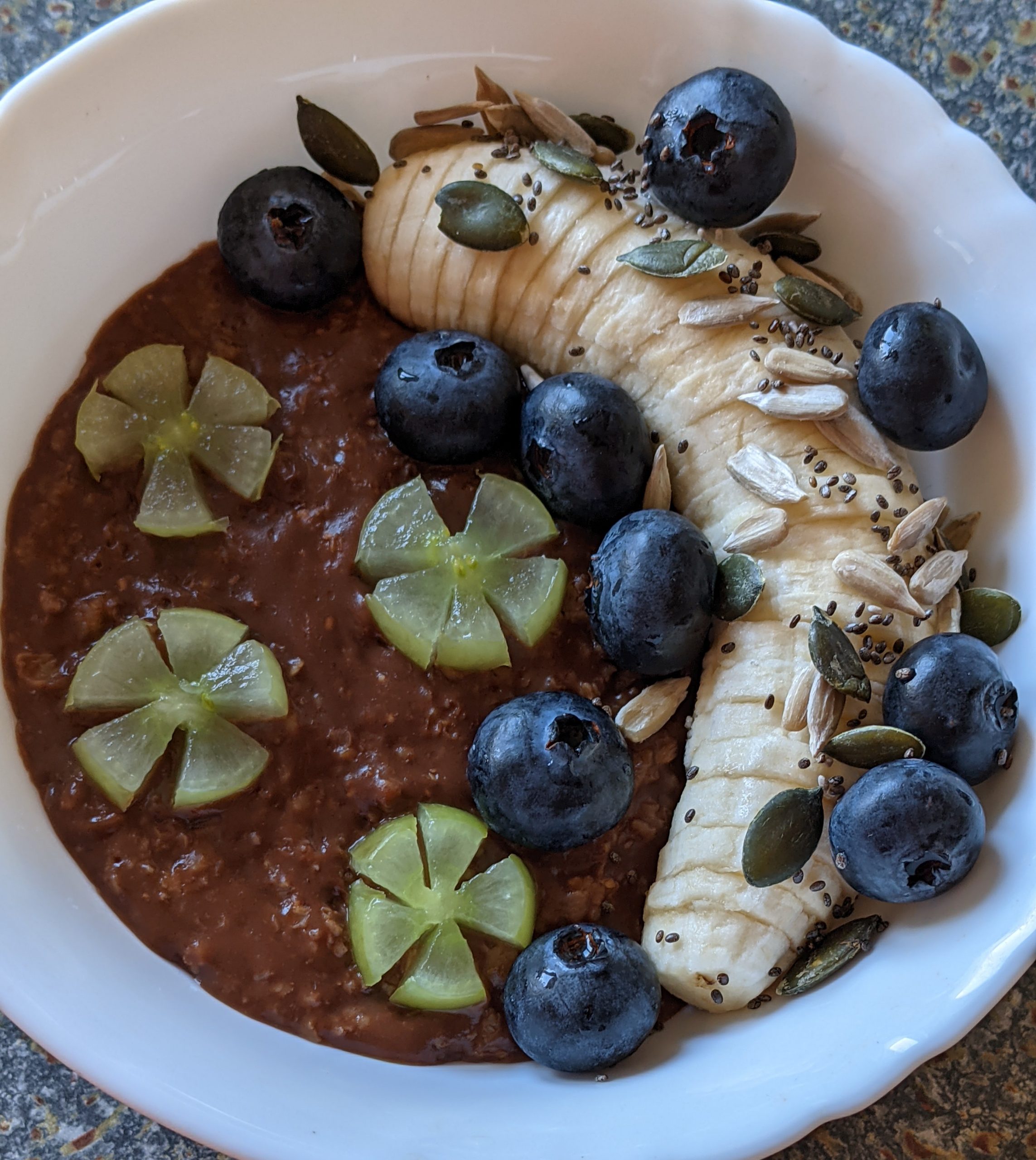 Chocolate-Chai-Oats-Breakfast-with-Blueberry-Banana-Grapes-Chia-Seeds-Sunflower-Seeds-Pumpkin-Seeds-and-Honey-healthy-breakfast-recipes-oatmeal-oats-breakfast