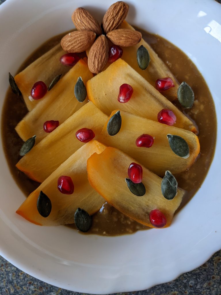 Easy Winter Breakfast Oats with Ginger Molasses Persimmon Pomegranate Almonds and Pumpkin Seeds