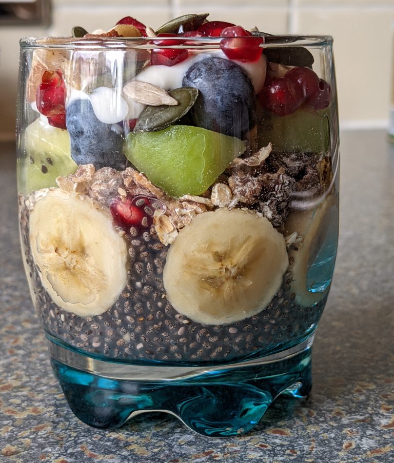 Healthy Chia Pudding Dessert with Granola / Muesli, Banana, Kiwi Fruit, Yoghurt, Blueberries, Sunflower Seeds & Pumpkin Seeds