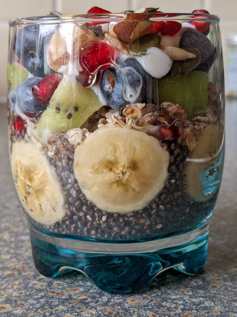 healthy-chia-pudding-with-granola-muesli-banana-kiwi-fruit-yoghurt-blueberries-sunflower-seeds-pumpkin-seeds-healthy-dessert-healthy-breakfast