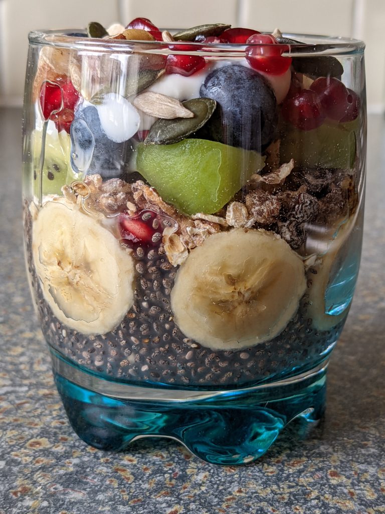 healthy-chia-pudding-with-granola-muesli-banana-kiwi-fruit-yoghurt-blueberries-sunflower-seeds-pumpkin-seeds-healthy-dessert-healthy-breakfast