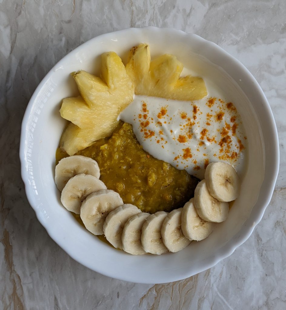 warm-turmeric-oats-with-yoghurt-banana-and-pineapple-breakfast-recipes-breakfast-bowls-yoghurt-bowls-oatmeal-banana-recipes-vegan-recipes-vegetarian-recipes