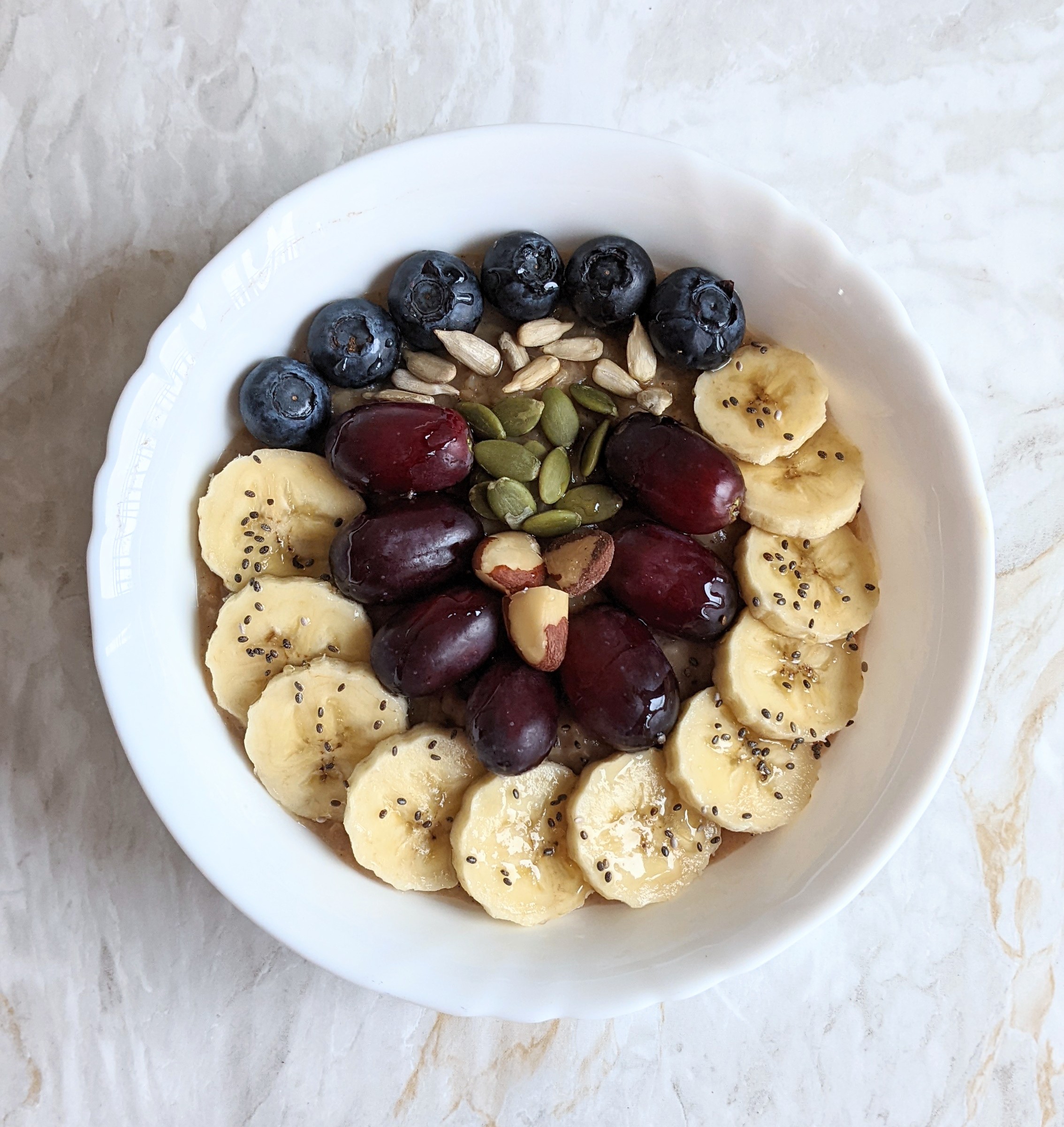 stress-relief-ashwagandha-chia-chai-spiced-banana-breakfast-oats-ashwagandha-recipes-oatmeal-with-chia-seeds-pumpkin-seeds-sunflower-seeds-easy-breakfast-porridge-recipes-with-brazil-nuts-cinnamon