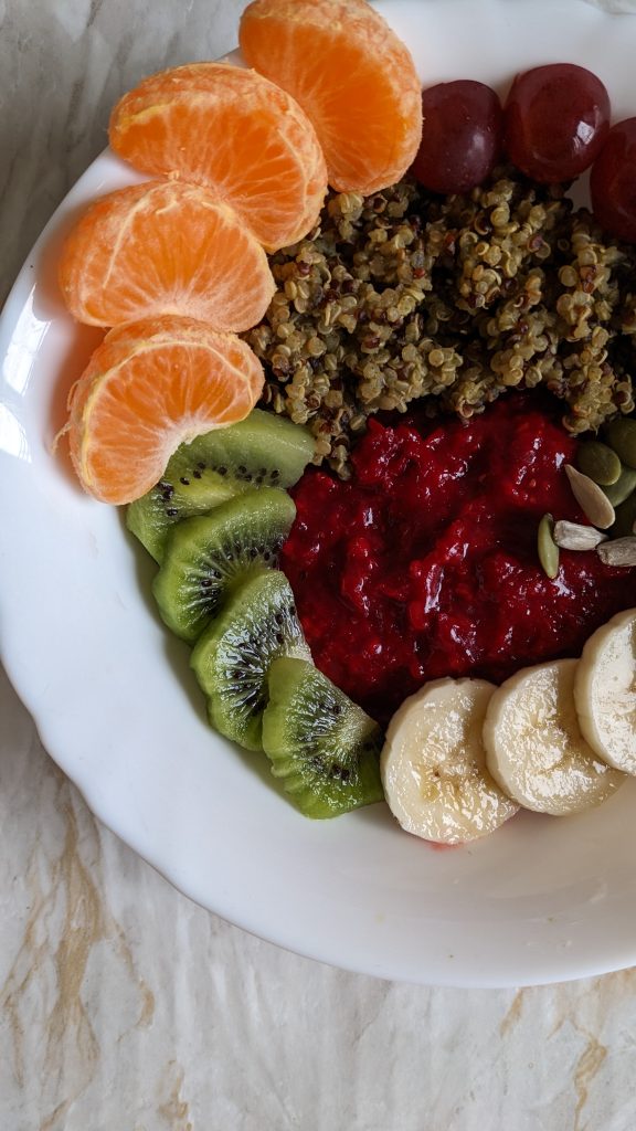ginger-powder-beetroot-porridge-with-moringa-quinoa-and-fruits-sunflower-seeds-pumpkin-seeds-healthy-breakfast-recipes-rainbow-breakfast-bowl-blue-pea-flower-tea