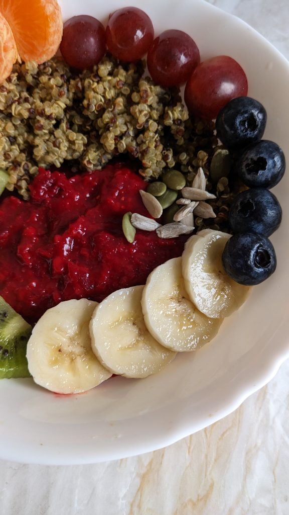 ginger-powder-beetroot-porridge-with-moringa-quinoa-and-fruits-sunflower-seeds-pumpkin-seeds-healthy-breakfast-recipes-rainbow-breakfast-bowl-blue-pea-flower-tea
